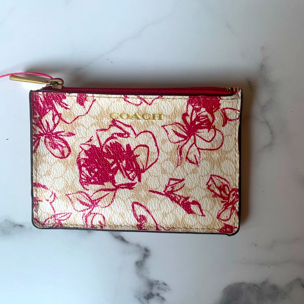 Coach key holder for credit cards and coins.